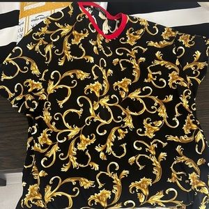 Neatly worn Versace baroque tshirt..